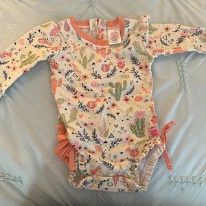 Rufflebutts one piece rash guard swimsuit!